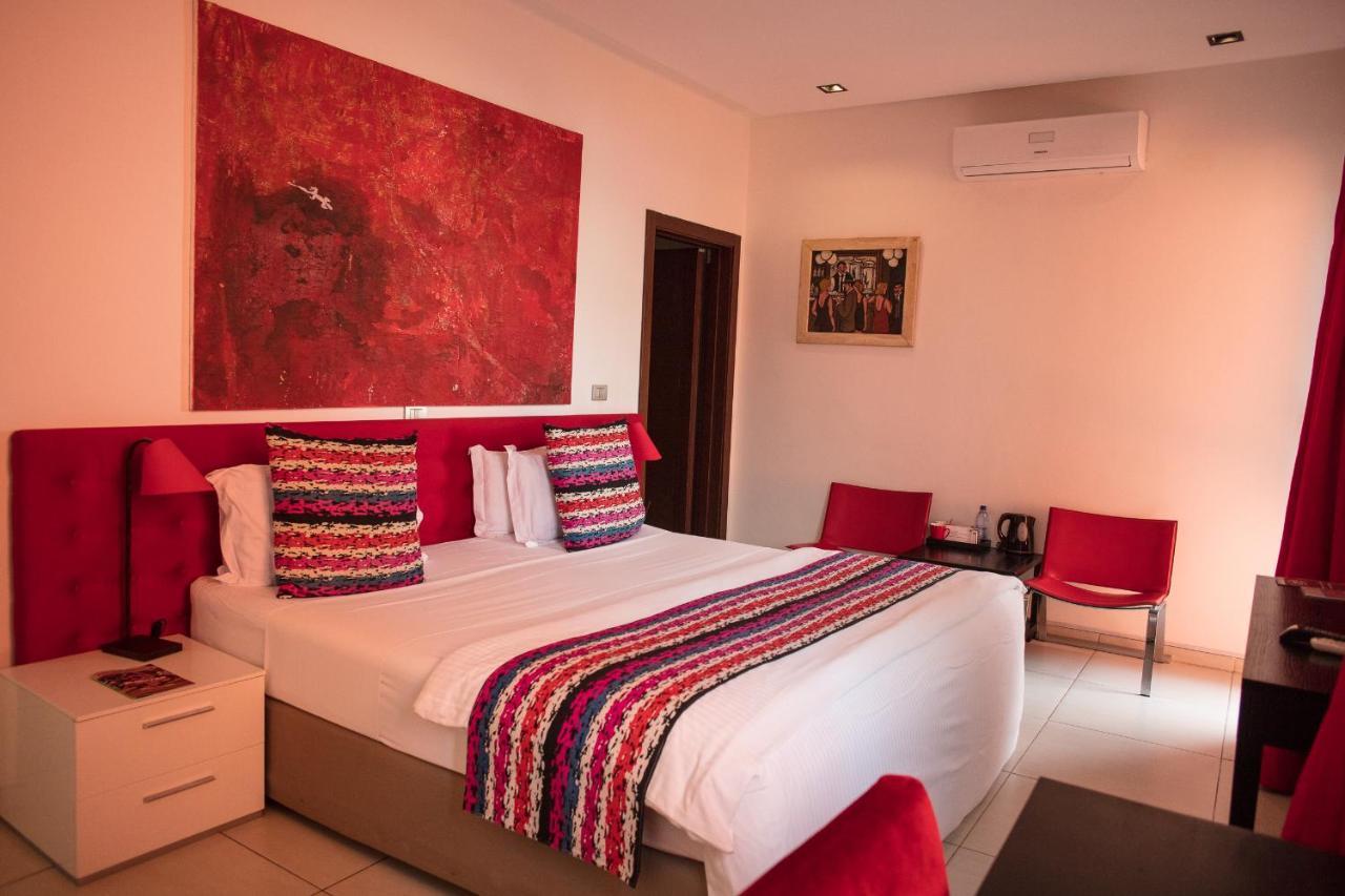 Hotel Maison Rouge Котону Экстерьер фото