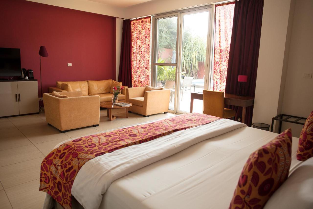 Hotel Maison Rouge Котону Экстерьер фото
