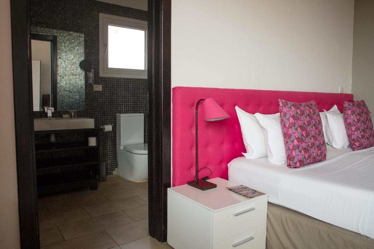 Hotel Maison Rouge Котону Экстерьер фото