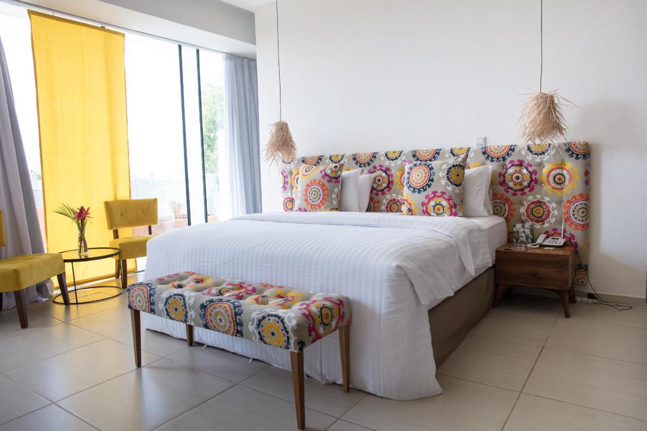 Hotel Maison Rouge Котону Экстерьер фото